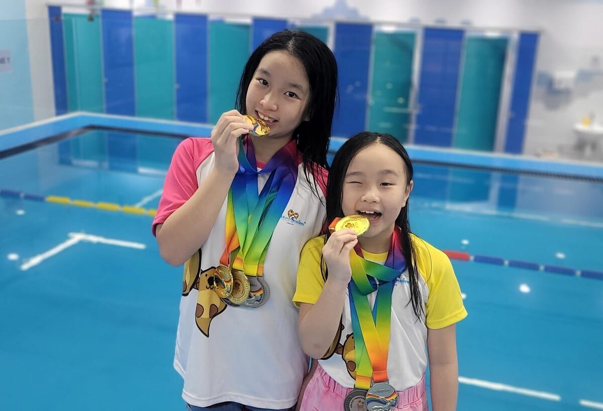 Swimmers with their medals